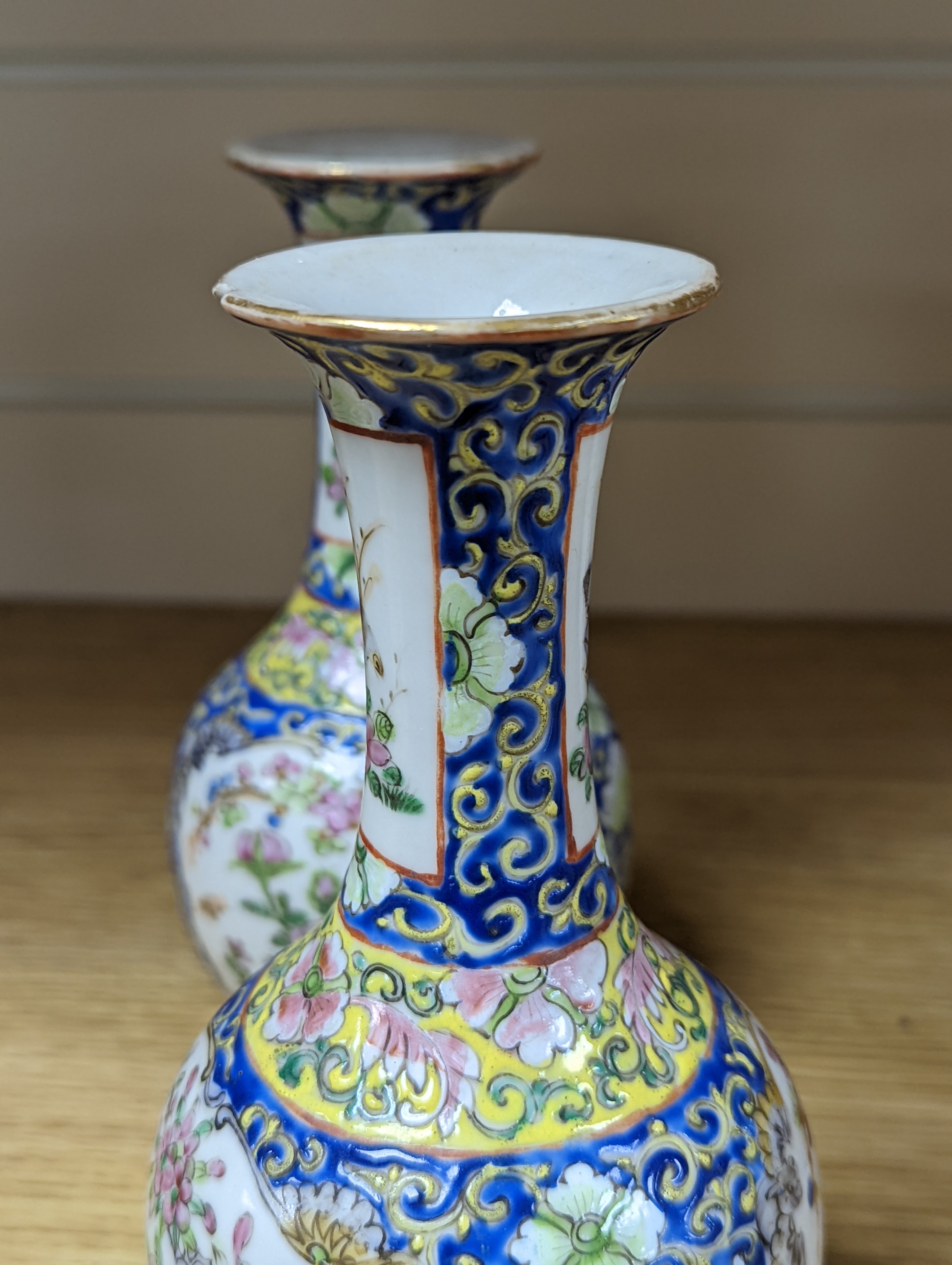 Four 19th century Chinese famille rose vases, 21cm